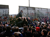 Crowd of people in front of Berlin Wall